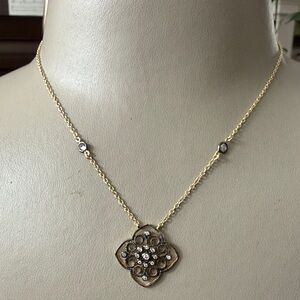 Elegant Gold and Silver Floral Necklace